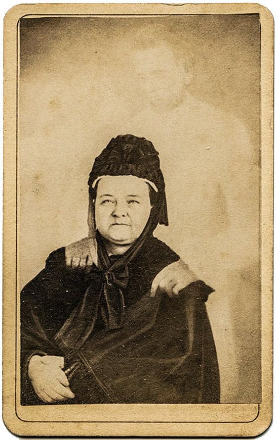Mary Todd Lincoln with the "ghost" of her husband.