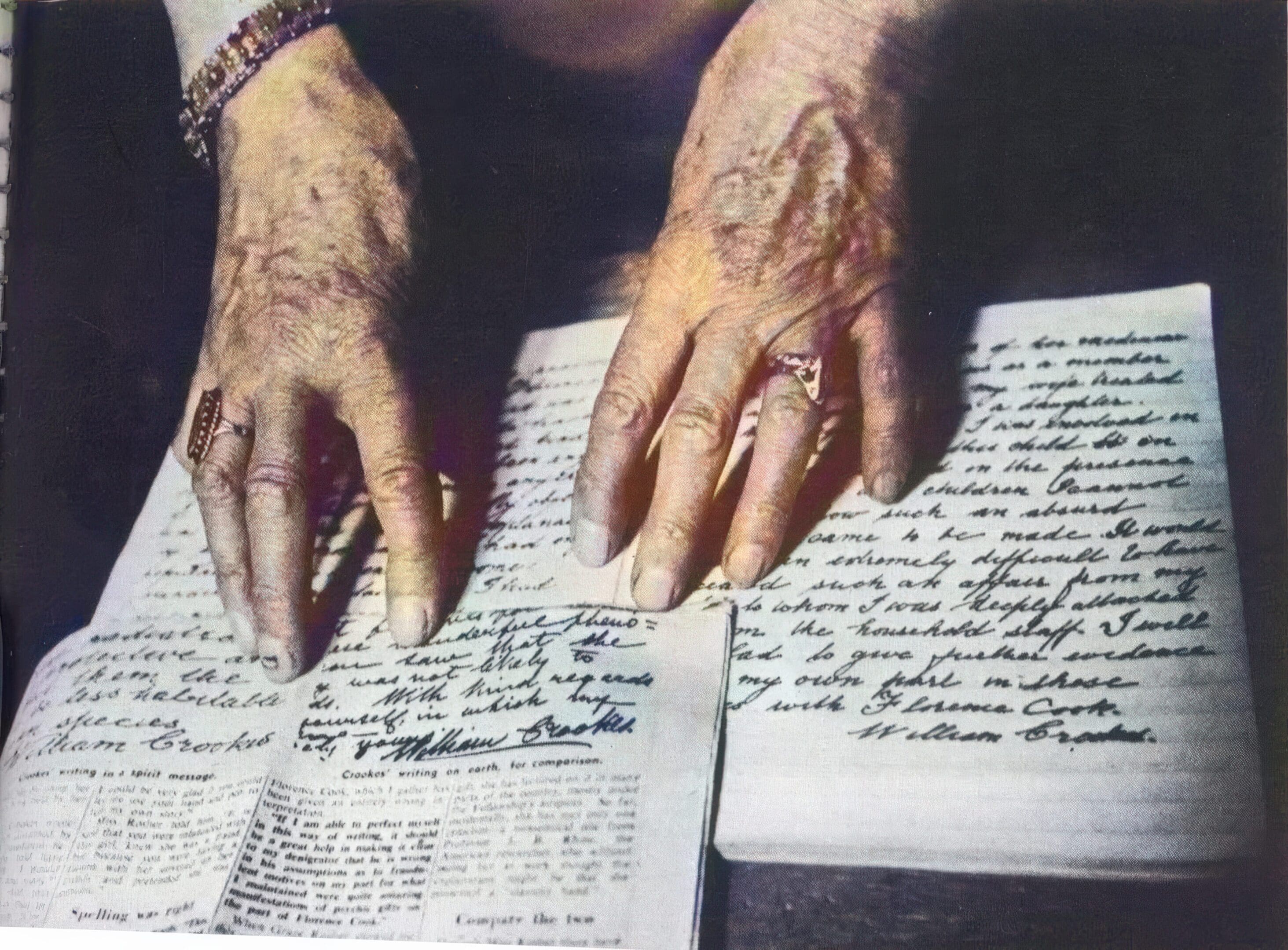 Rosher comparing a spirit message she claimed to receive from Sir William Crookes with a facsimile of his normal handwriting during his life.