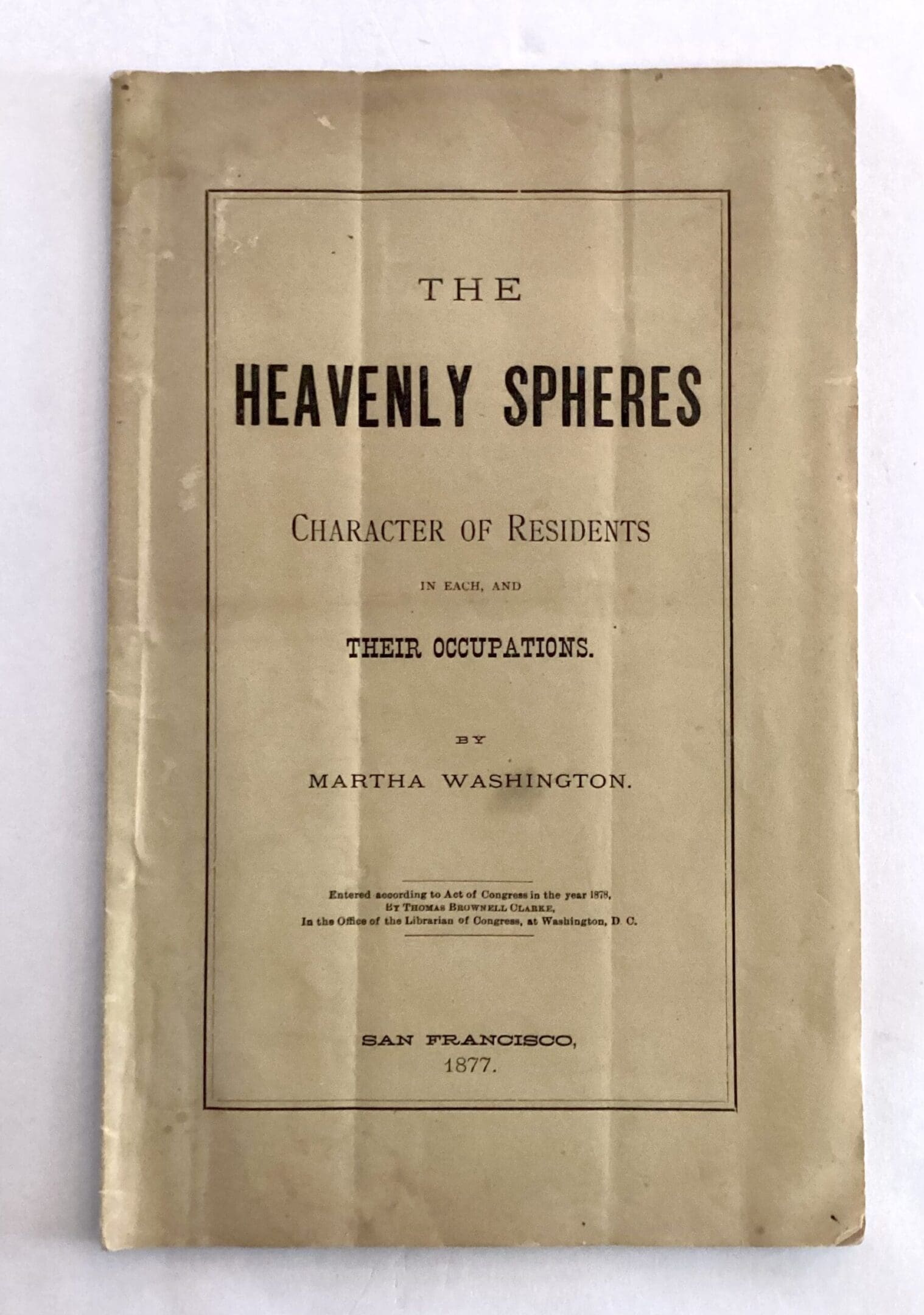 Old book cover titled "The Heavenly Spheres".