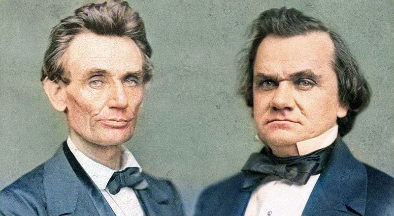 Two historical figures in formal attire.