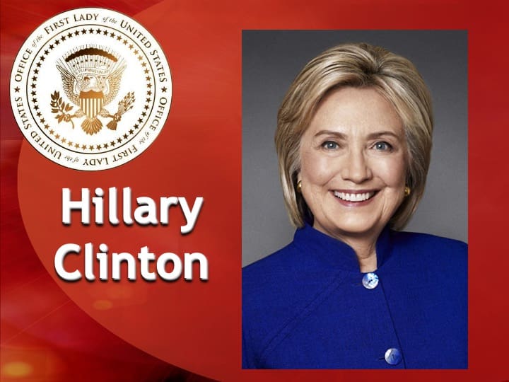 Smiling woman with seal and red background.