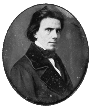 Man in vintage formal attire, serious expression.