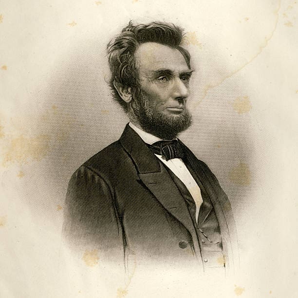 Portrait of a man in formal attire.
